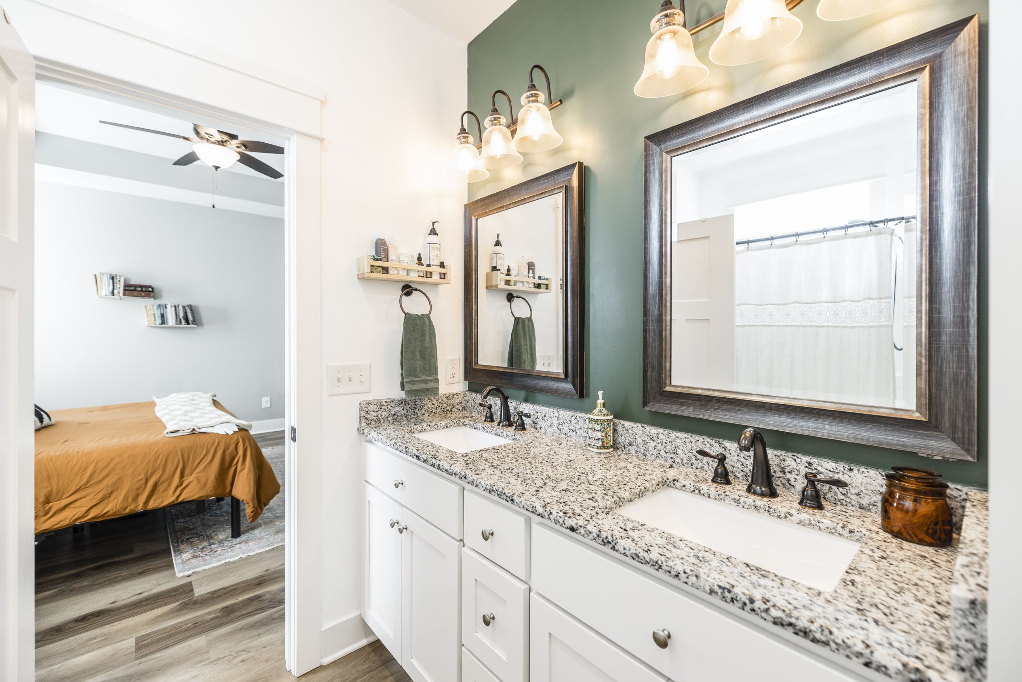 324 East Biggs Road Portland, TN 37148 - Photo 56 of 57 a en suite bathroom with a granite countertop double vanity sink and a mirror