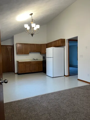 a view of a livingroom with furniture