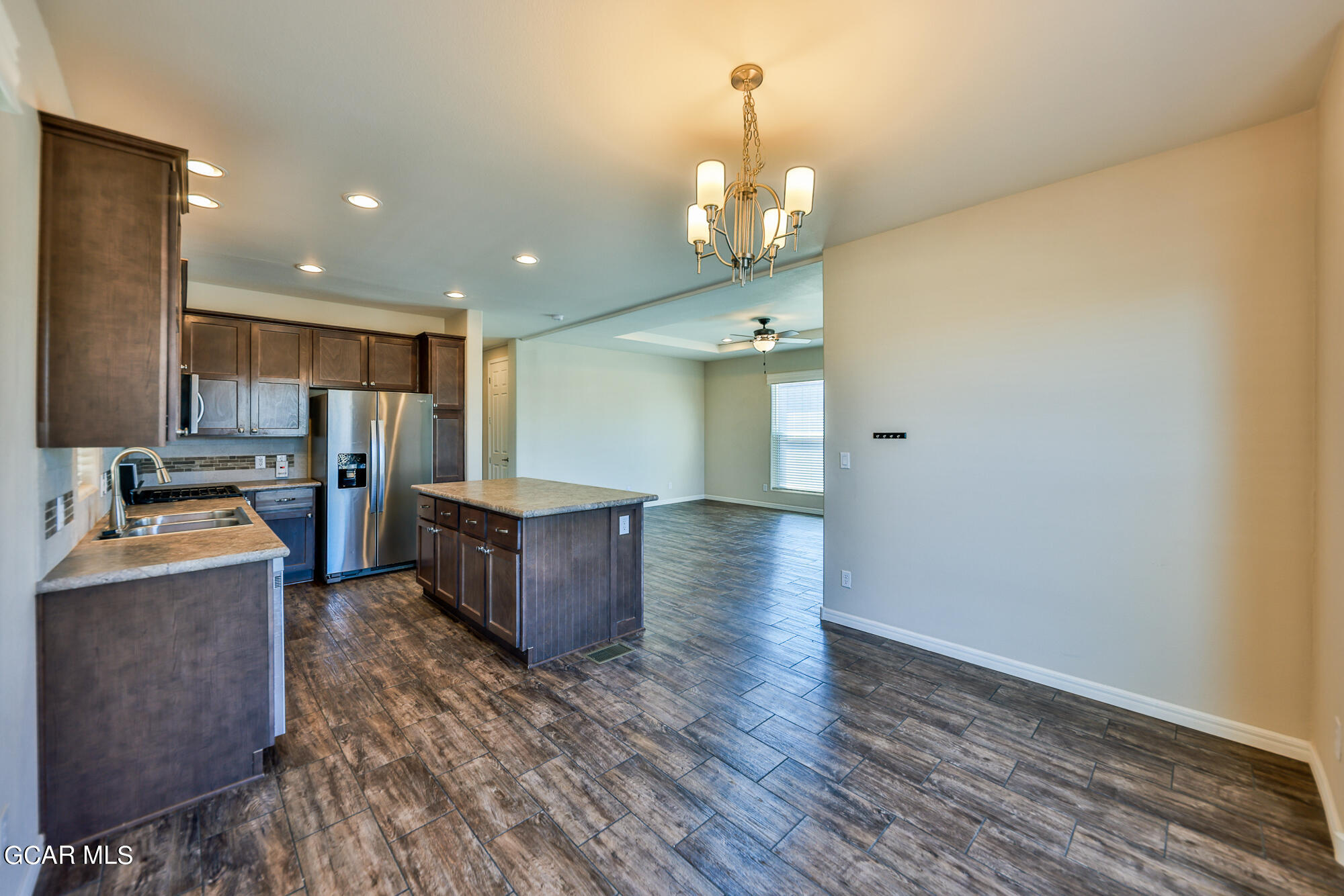 551 Summit Trail, Unit 145 Granby, CO 80446 - Photo 18 of 39 a view of kitchen with cabinets and wooden floor