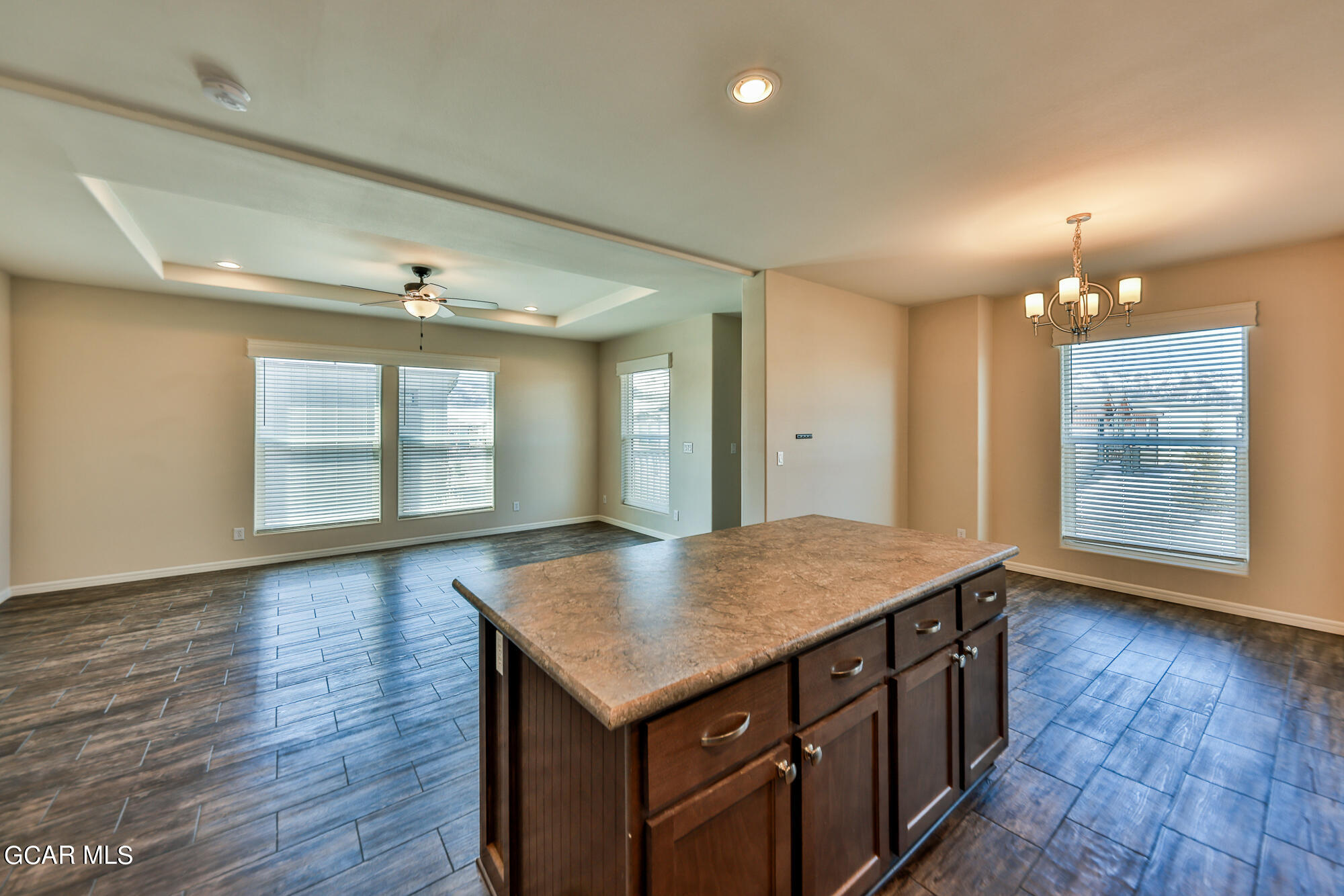 551 Summit Trail, Unit 145 Granby, CO 80446 - Photo 22 of 39 an empty room with wooden floor and window