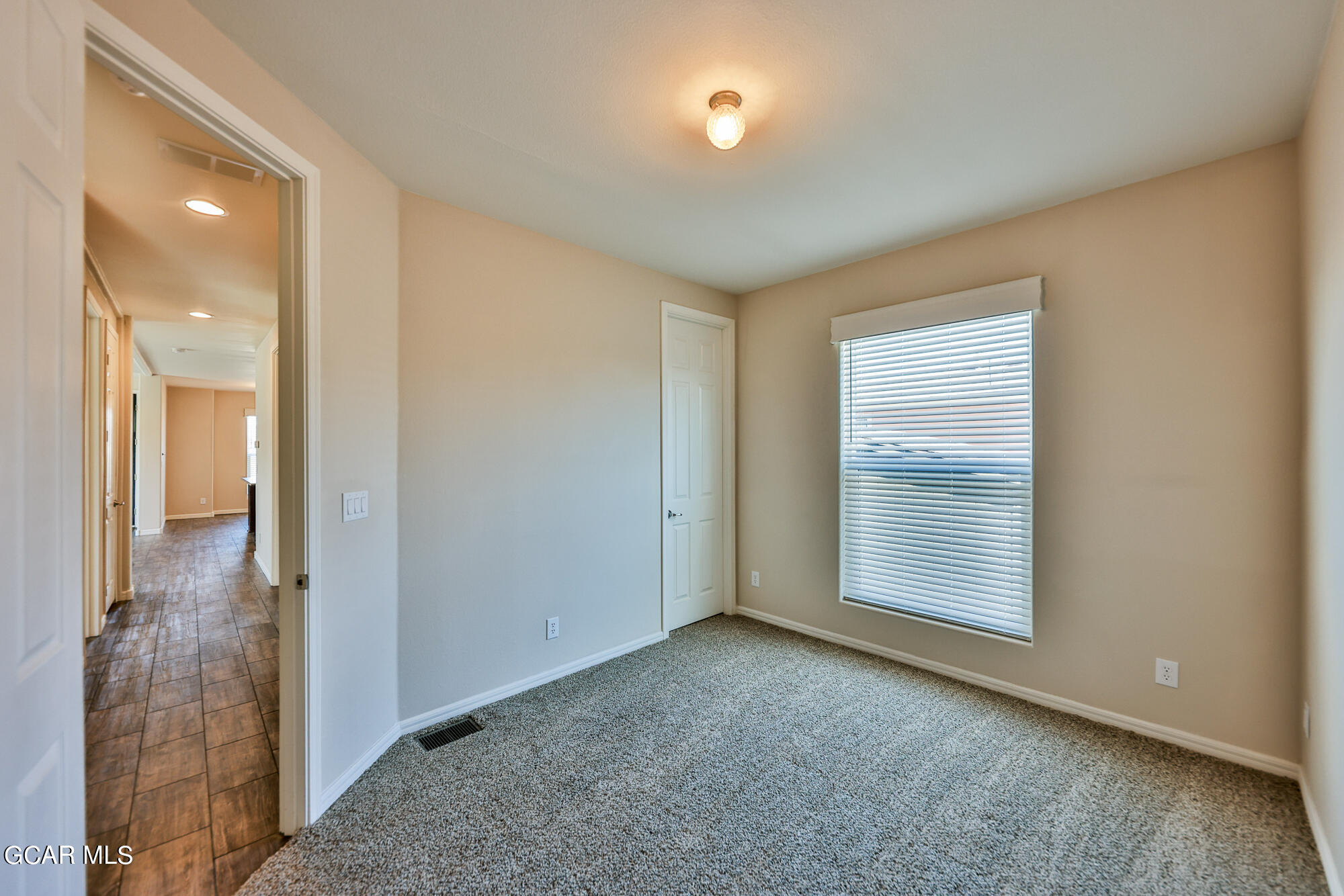 551 Summit Trail, Unit 145 Granby, CO 80446 - Photo 29 of 39 an empty room with windows