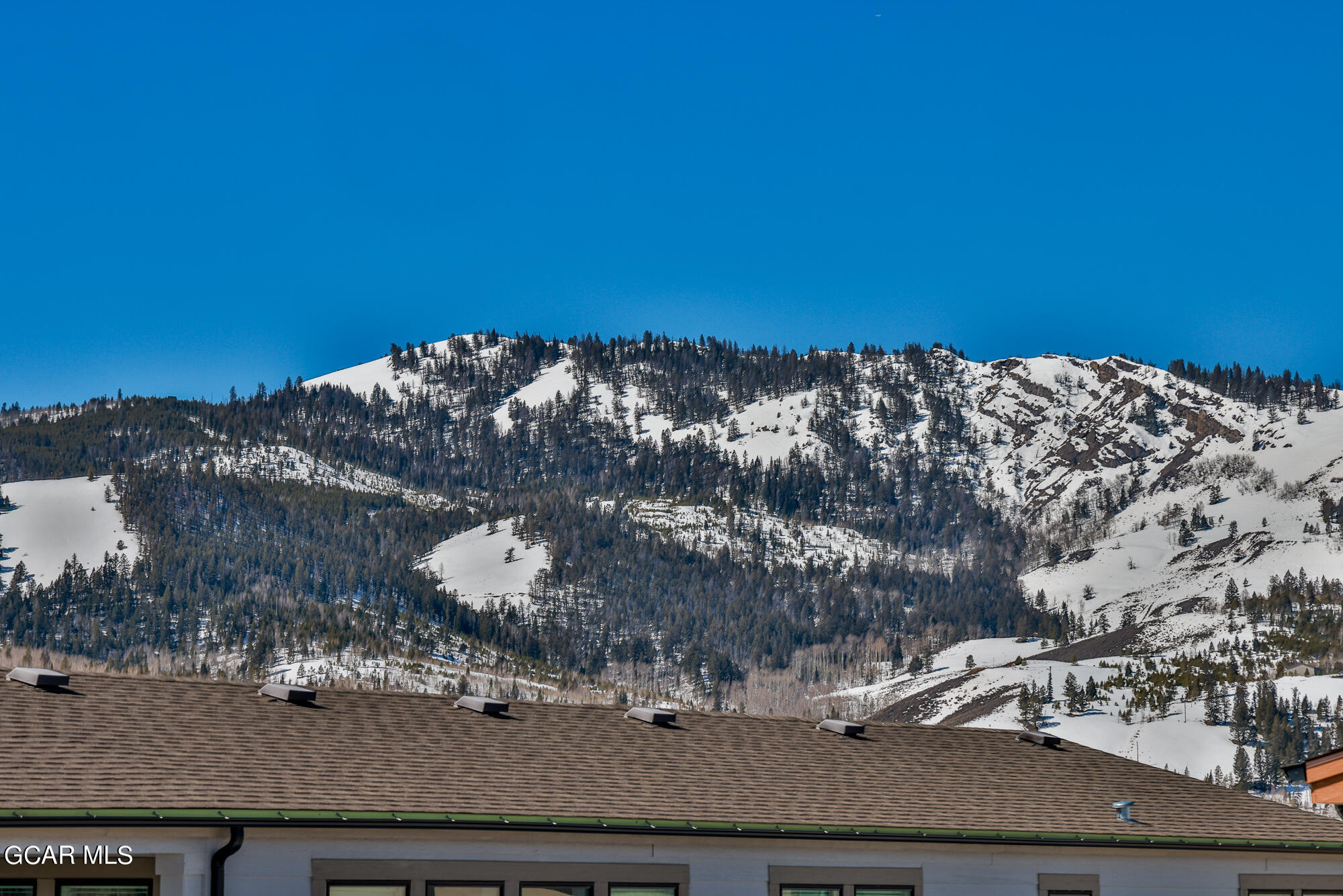 551 Summit Trail, Unit 145 Granby, CO 80446 - Photo 39 of 39 a view of a house with a yard
