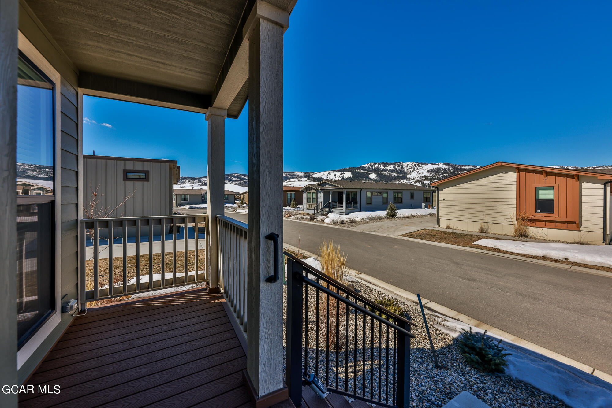 551 Summit Trail, Unit 145 Granby, CO 80446 - Photo 6 of 39 a view of a balcony with two chairs