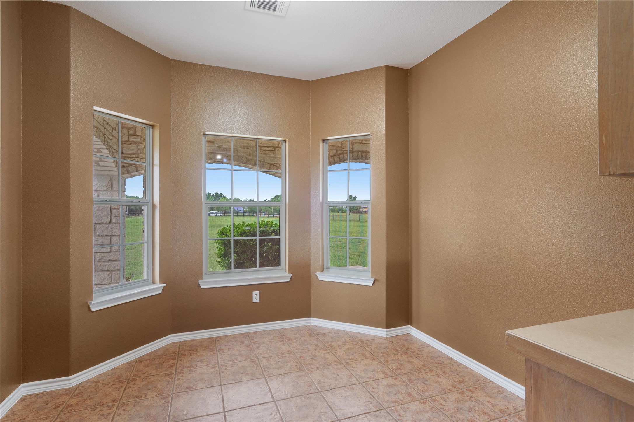 130 Cotton Rows Lane Taylor, TX 76574 - Photo 21 of 32 a view of an empty room with a window