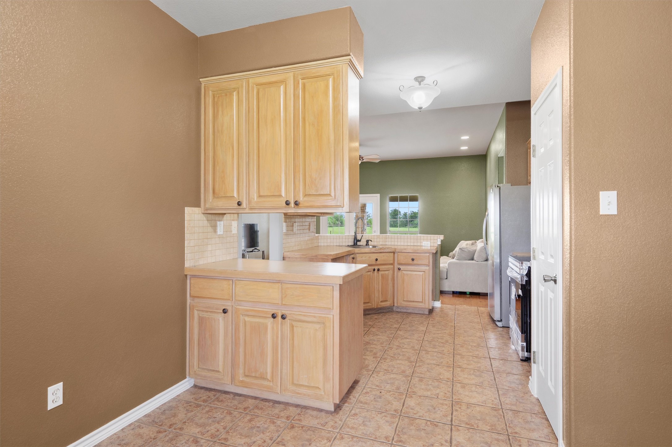 130 Cotton Rows Lane Taylor, TX 76574 - Photo 25 of 32 a large white room with a mirror and a sink