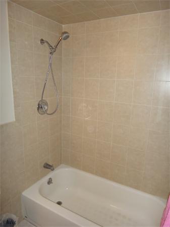 270 Main Street, Unit 2 North Reading, MA 01864 - Photo 7 of 7 a bathroom with a bathtub
