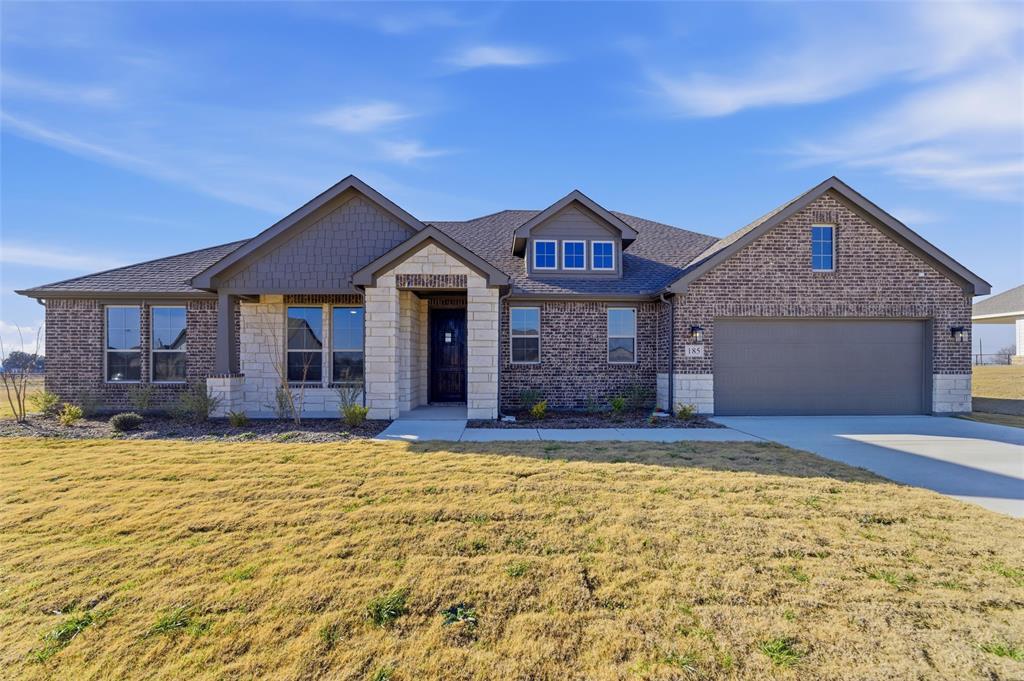 185 Brandywine Trail Rhome, TX 76078 - Photo 1 of 27 a view of a house with a swimming pool