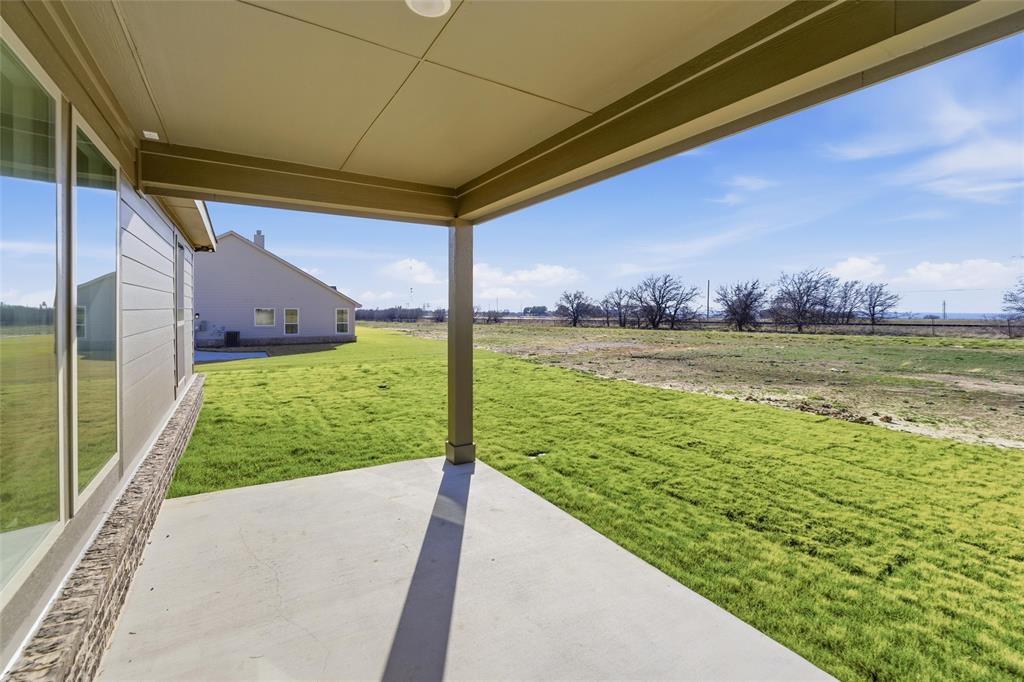 185 Brandywine Trail Rhome, TX 76078 - Photo 5 of 27 View of patio featuring a view of rural / pastoral area