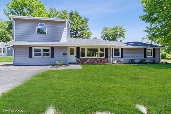 5 Dix Road Brockton, MA 02302 - Photo 1 of 15 a front view of a house with garden