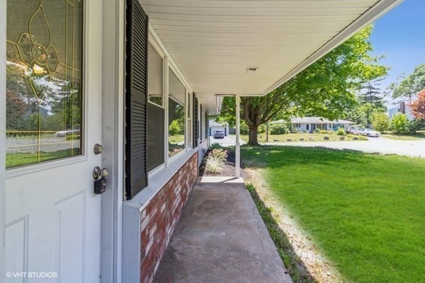 5 Dix Road Brockton, MA 02302 - Photo 3 of 15 a view of a porch with a yard