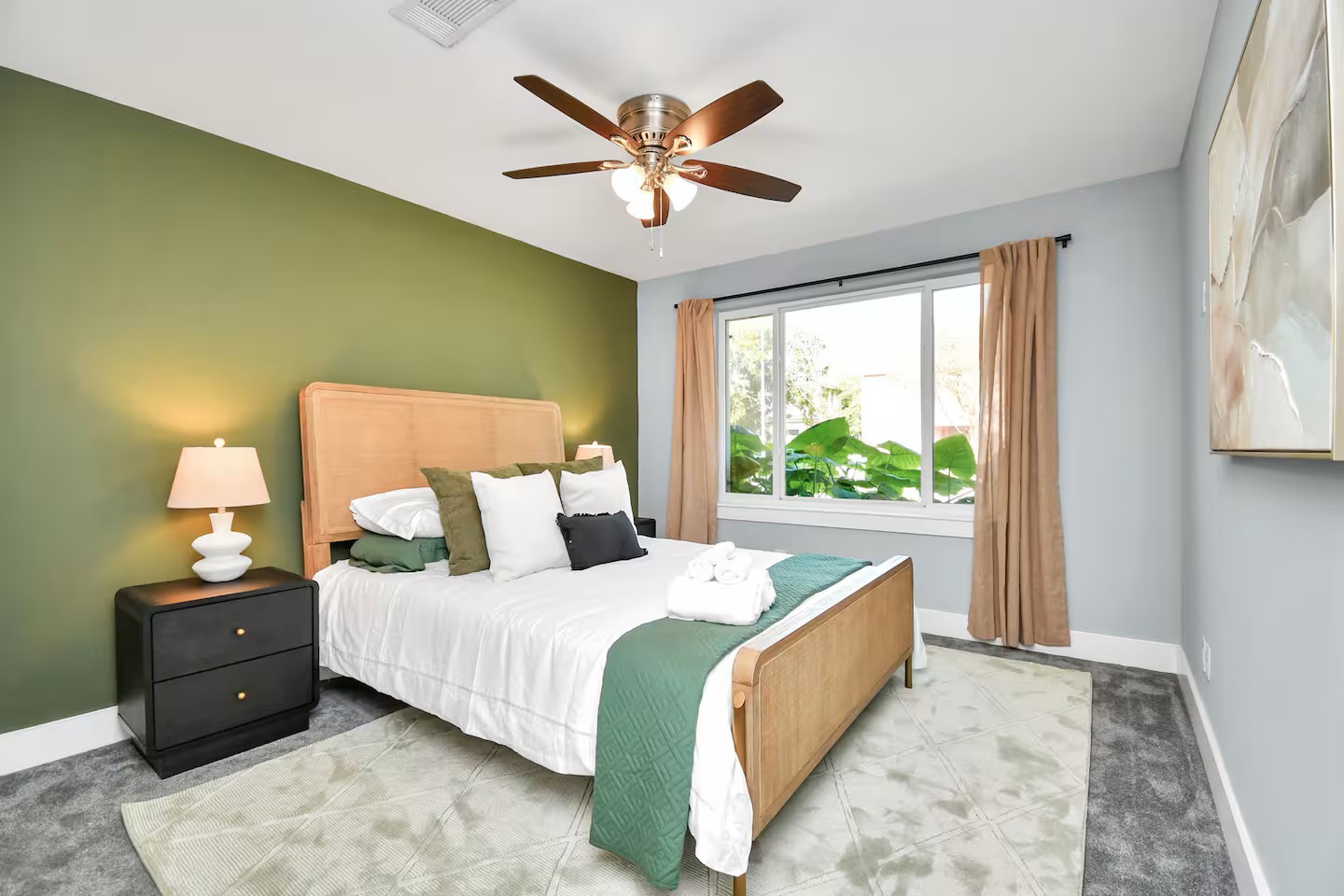 3318 Wichita Street Houston, TX 77004 - Photo 10 of 36 a bedroom with a bed and a large window