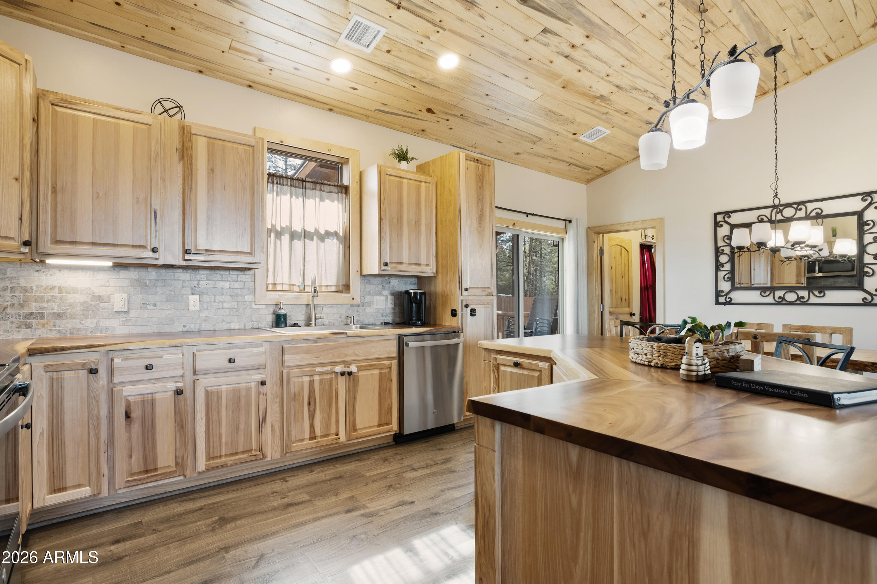 2718 Church Lane Overgaard, AZ 85933 - Photo 13 of 51 a kitchen with sink cabinets and window