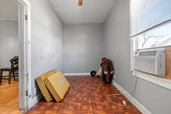 a view of a bedroom with window