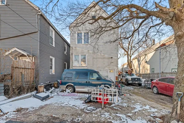 a car parked in front of a house