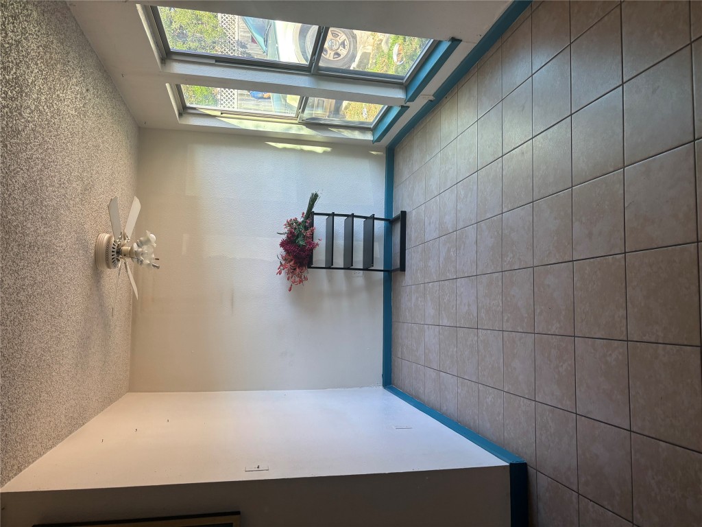 7926 Mullen Drive, Unit 1 Austin, TX 78757 - Photo 1 of 9 a view of an empty room with a window