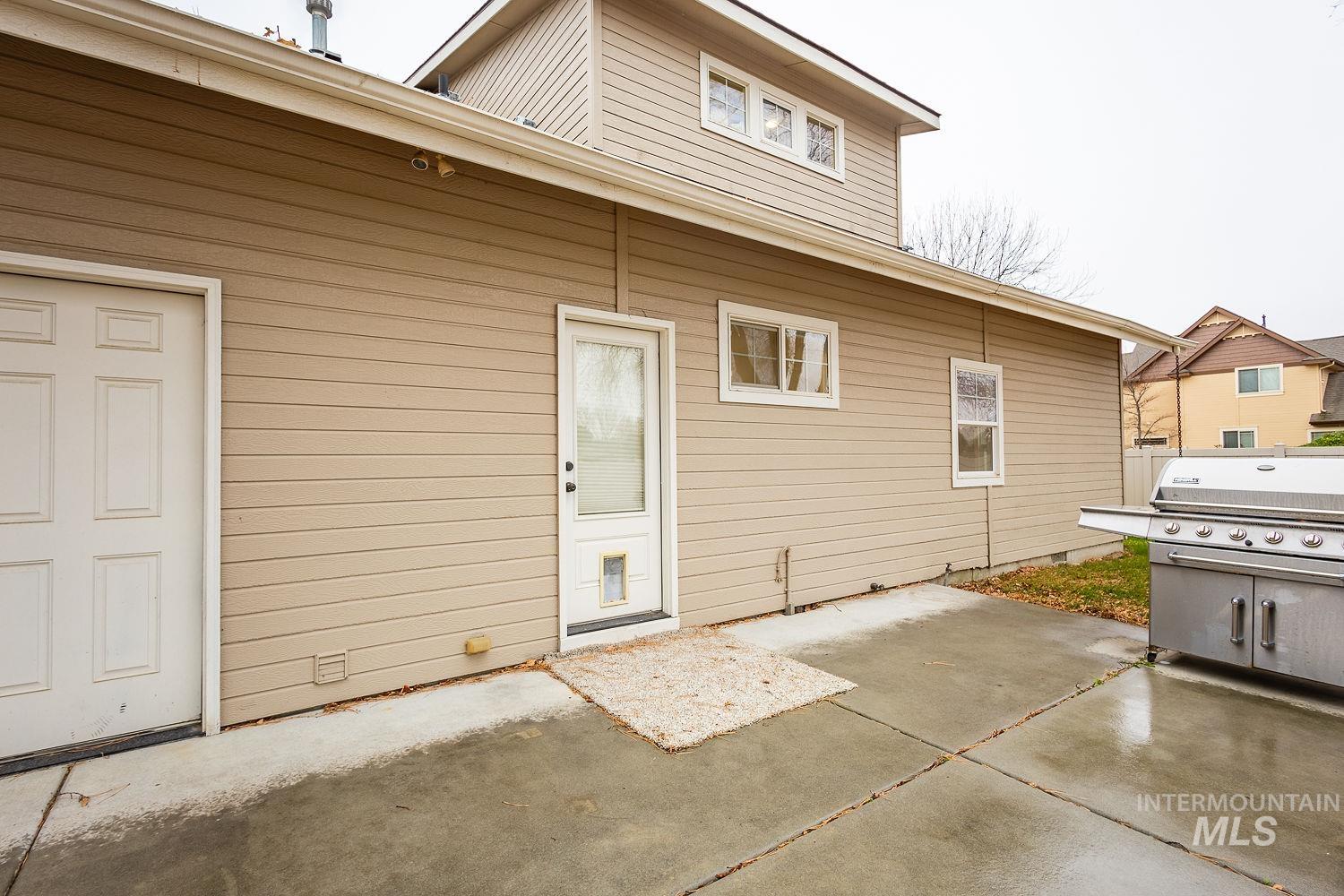 215 South Spring Lake Way Star, ID 83669 - Photo 40 of 50 Rear view of property with a patio