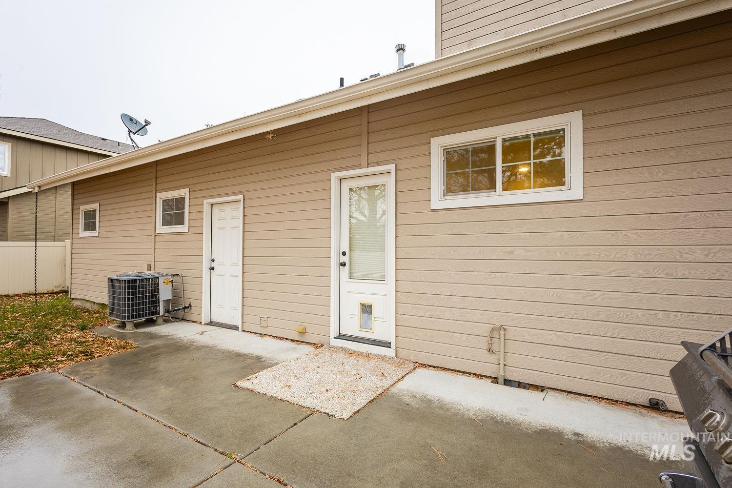 215 South Spring Lake Way Star, ID 83669 - Photo 41 of 50 Back of house featuring a patio area