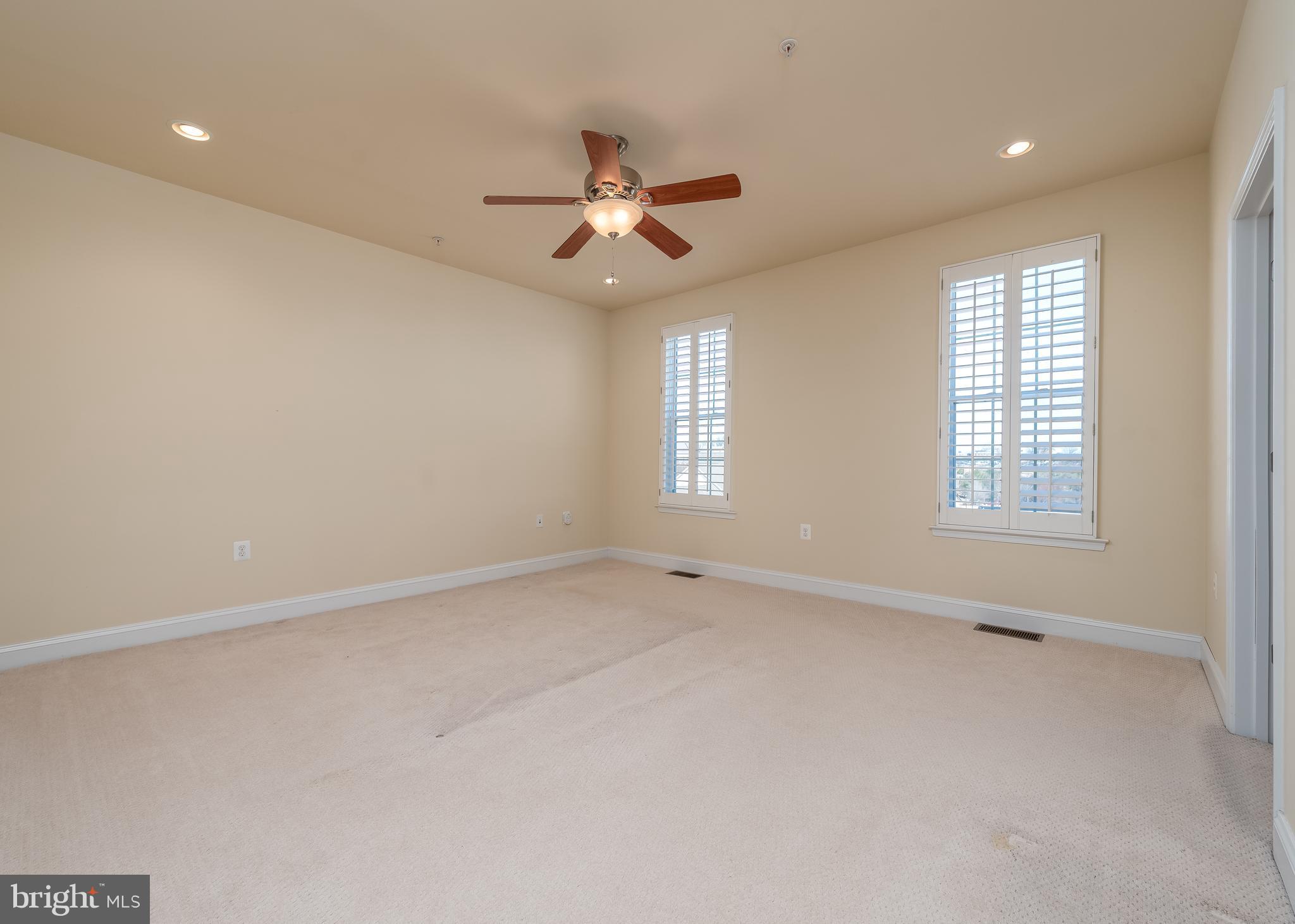 7662 Maple Lawn Boulevard, Unit 26 Fulton, MD 20759 - Photo 12 of 37 a view of an empty room with a window
