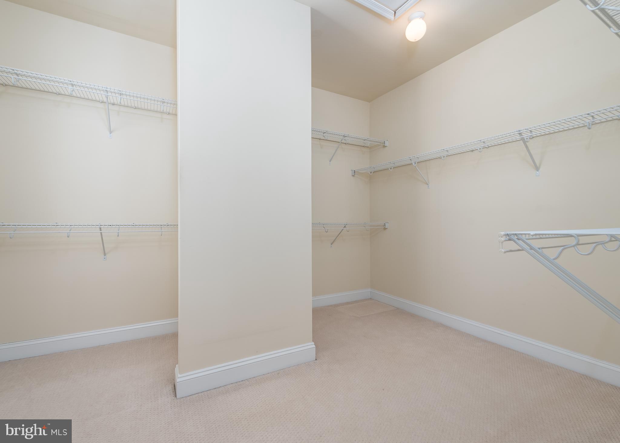 7662 Maple Lawn Boulevard, Unit 26 Fulton, MD 20759 - Photo 14 of 37 a view of a room with racks on the wall