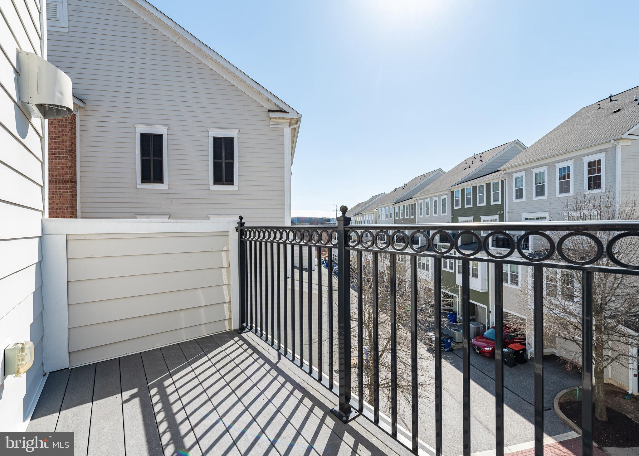 7662 Maple Lawn Boulevard, Unit 26 Fulton, MD 20759 - Photo 25 of 37 a view of a house with a balcony