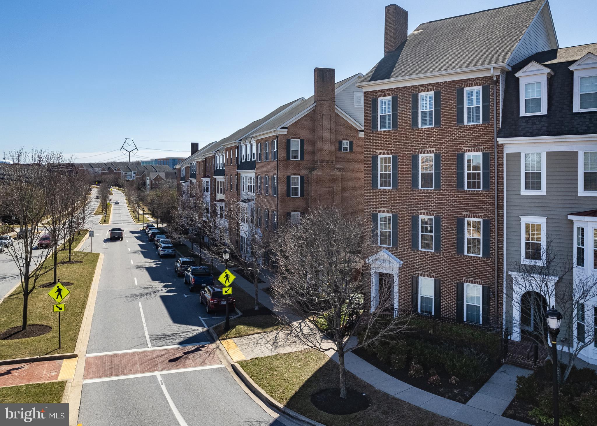 7662 Maple Lawn Boulevard, Unit 26 Fulton, MD 20759 - Photo 27 of 37 a view of multiple houses with yard