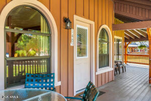 5829 East Buck Springs Road, Unit 140 Pinetop, AZ 85935 - Photo 19 of 37 a view of a house with a porch