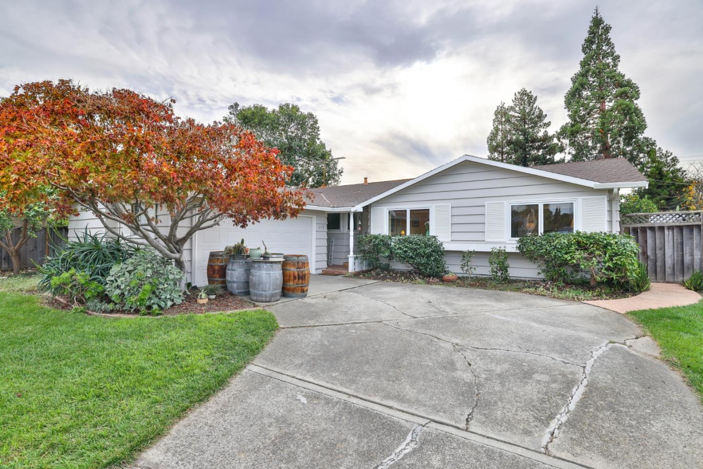 3772 Thrush Way Santa Clara, CA 95051 - Photo 3 of 21 a view of a house with a yard and potted plants