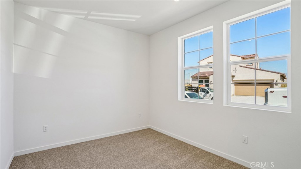 73578 Raphael Drive Palm Desert, CA 92211 - Photo 16 of 33 an empty room with windows