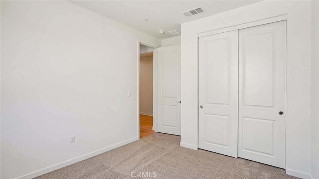 73578 Raphael Drive Palm Desert, CA 92211 - Photo 17 of 33 a view of an empty room