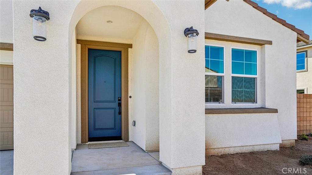 73578 Raphael Drive Palm Desert, CA 92211 - Photo 2 of 33 a view of front door of a house