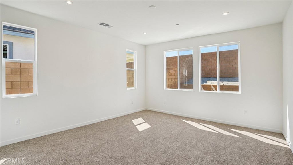 73578 Raphael Drive Palm Desert, CA 92211 - Photo 22 of 33 an empty room with a window