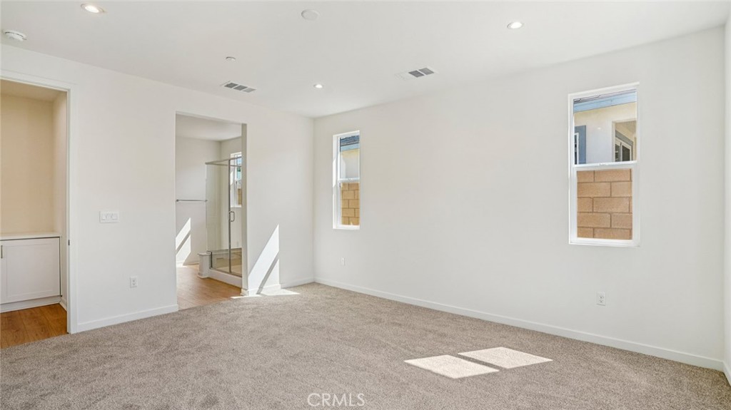 73578 Raphael Drive Palm Desert, CA 92211 - Photo 23 of 33 an empty room with a natural light