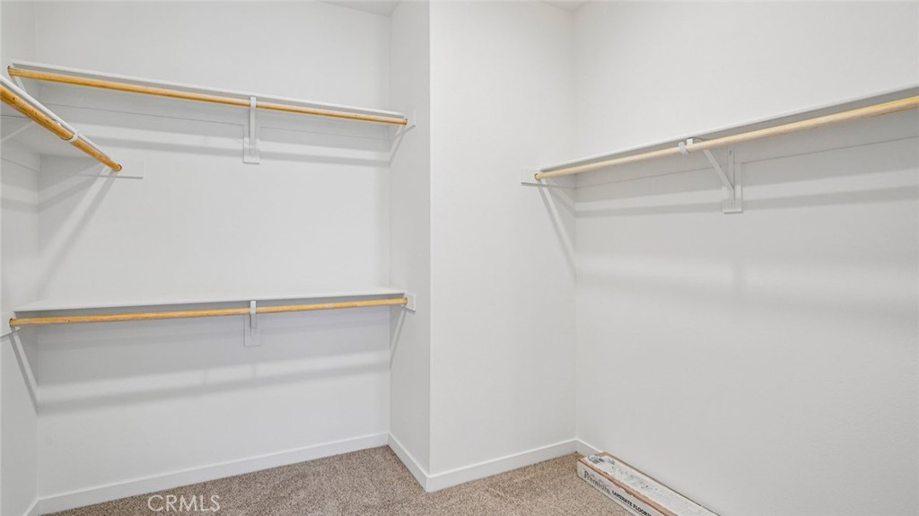 73578 Raphael Drive Palm Desert, CA 92211 - Photo 25 of 33 a view of an empty walk in closet