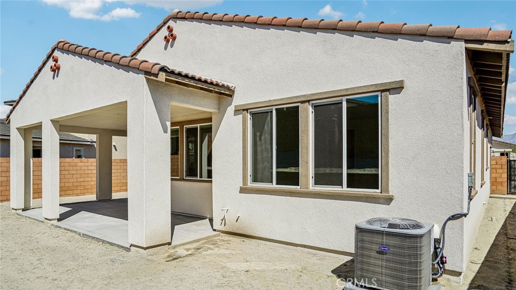 73578 Raphael Drive Palm Desert, CA 92211 - Photo 30 of 33 a view of a balcony with wooden floor and iron fence