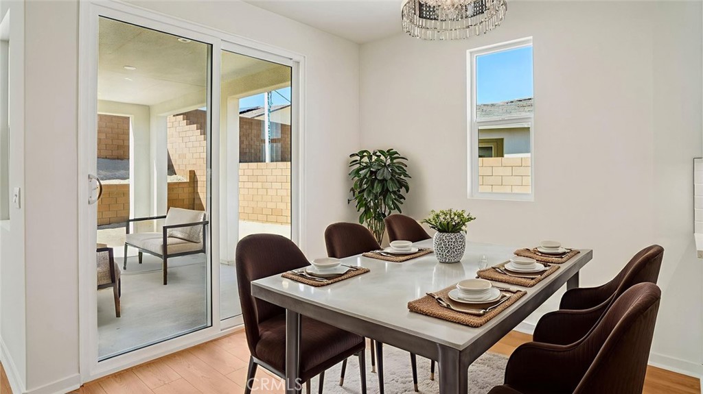 73578 Raphael Drive Palm Desert, CA 92211 - Photo 9 of 33 a view of a dining room with furniture and window