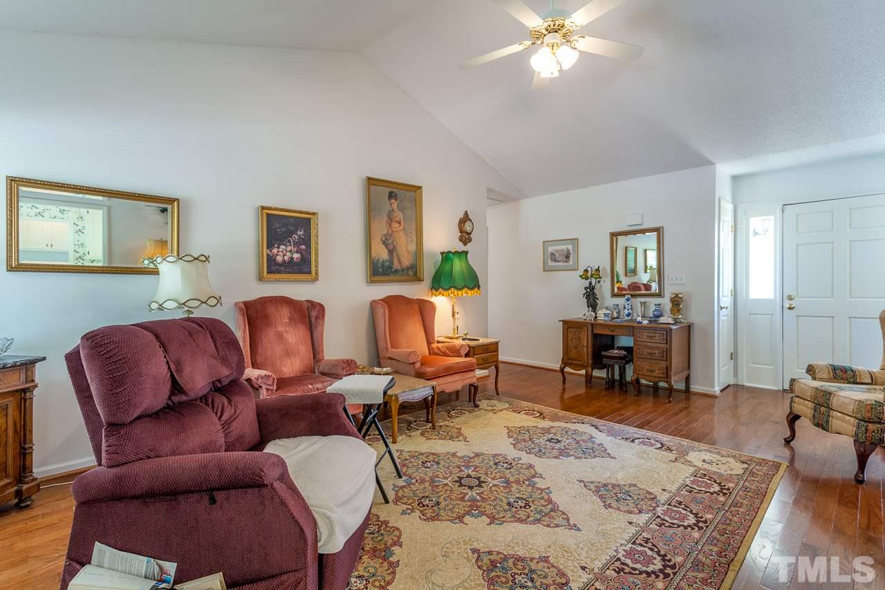 5110 Raleigh Road Benson, NC 27504 - Photo 10 of 24 a living room with furniture and wooden floor