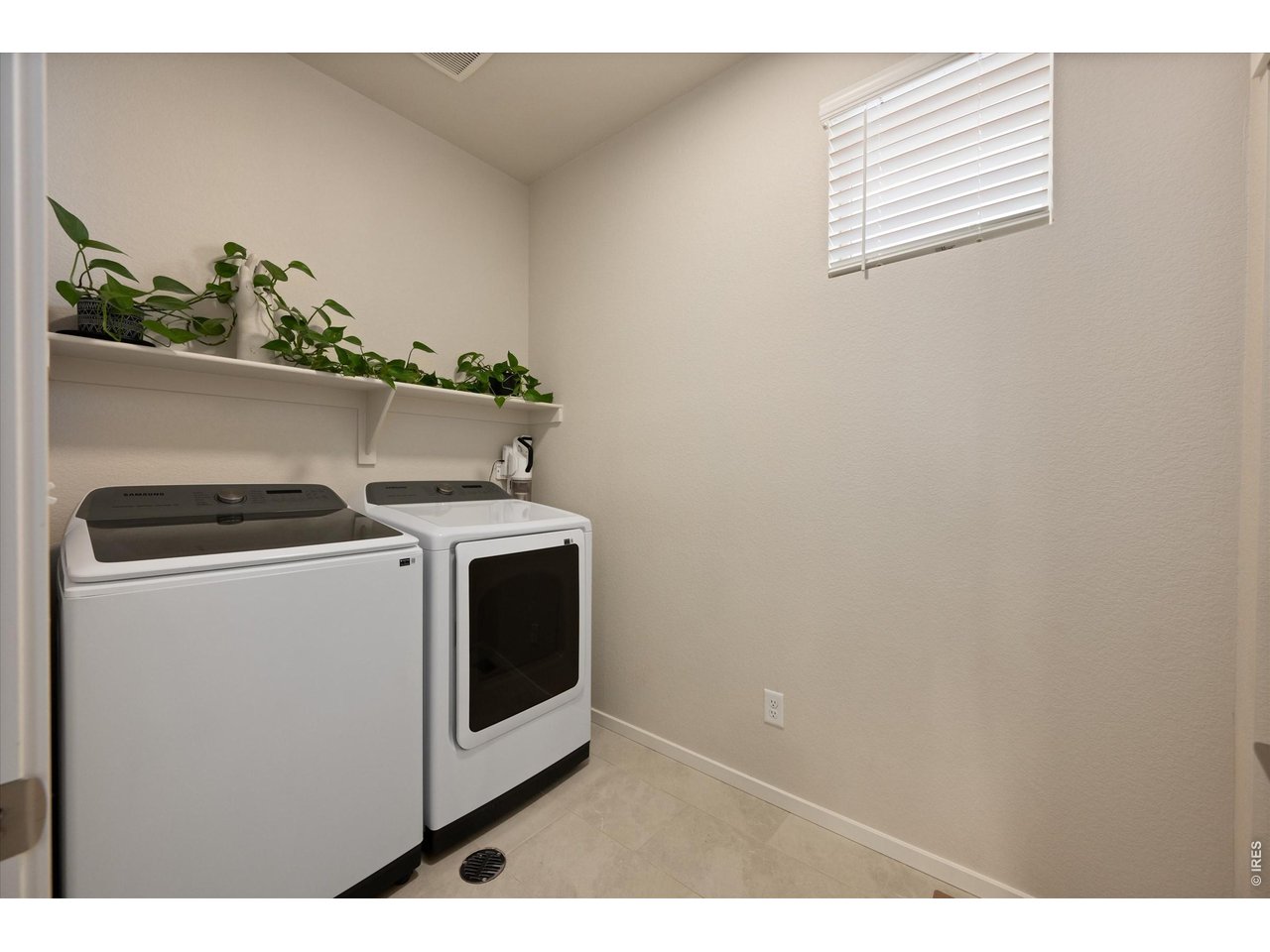 5251 Ribault Street Timnath, CO 80547 - Photo 25 of 47 Spacious laundry room just off the garage and hall closet