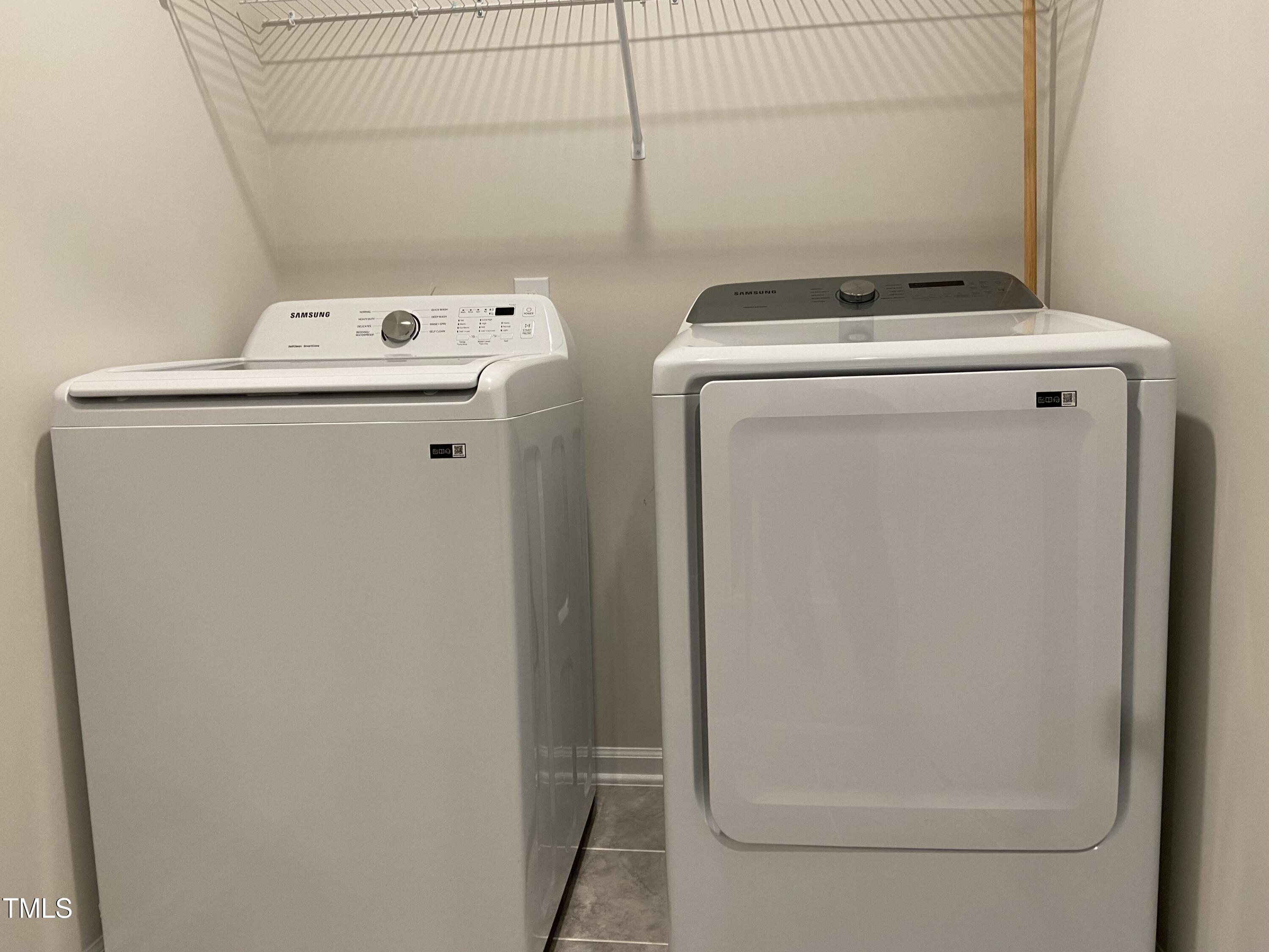 856 Patriot Summit Lane Apex, NC 27523 - Photo 19 of 25 a utility room with dryer and washer