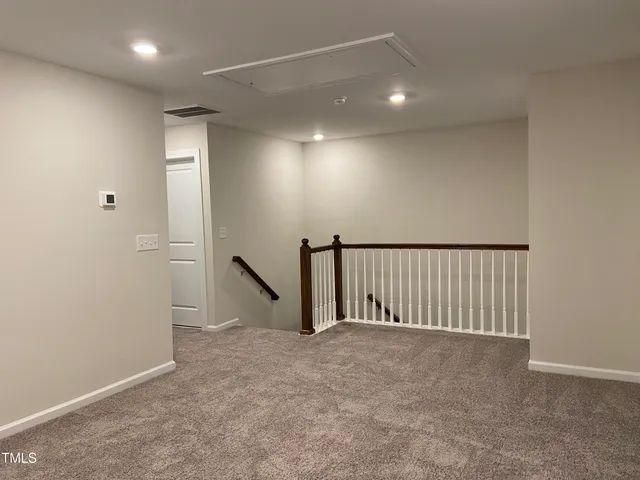 a view of staircase with wooden floor and stairs
