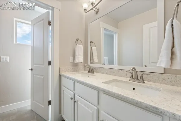 a bathroom with a toilet and a bathtub