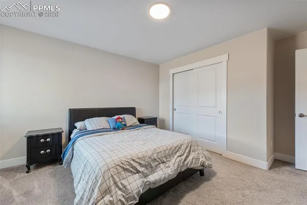 a view of a livingroom with stairs