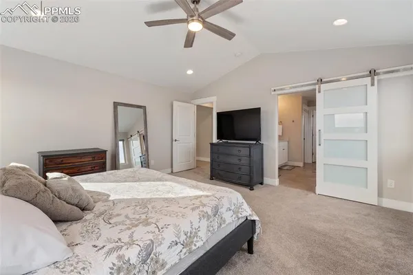 a spacious bathroom with a double vanity sink mirror and double