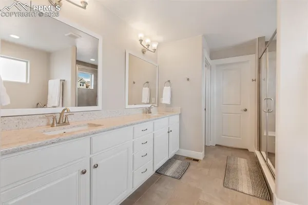 a white bath tub sitting in a bathroom