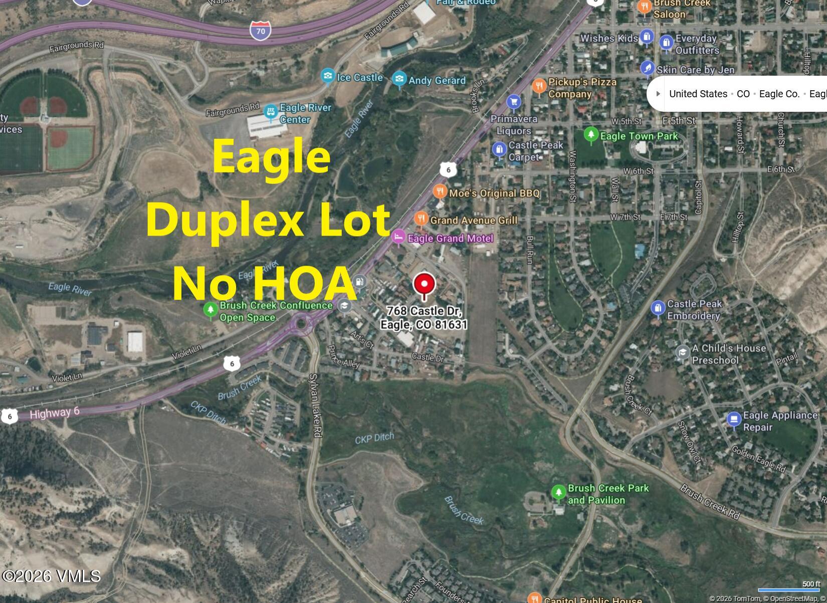 768 Castle Drive Eagle, CO 81631 - Photo 1 of 11 a sign that is on a brick wall