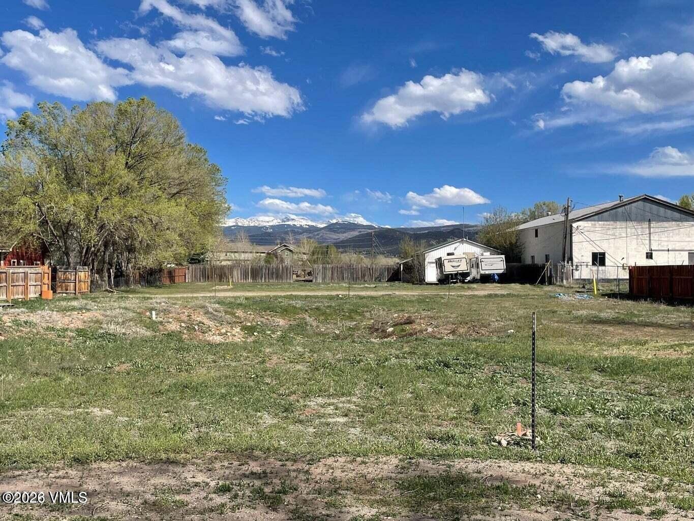 768 Castle Drive Eagle, CO 81631 - Photo 10 of 11 a view of a house with a yard