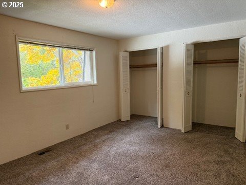 4695 Fox Hollow Road Eugene, OR 97405 - Photo 6 of 9 a view of an empty room with a window