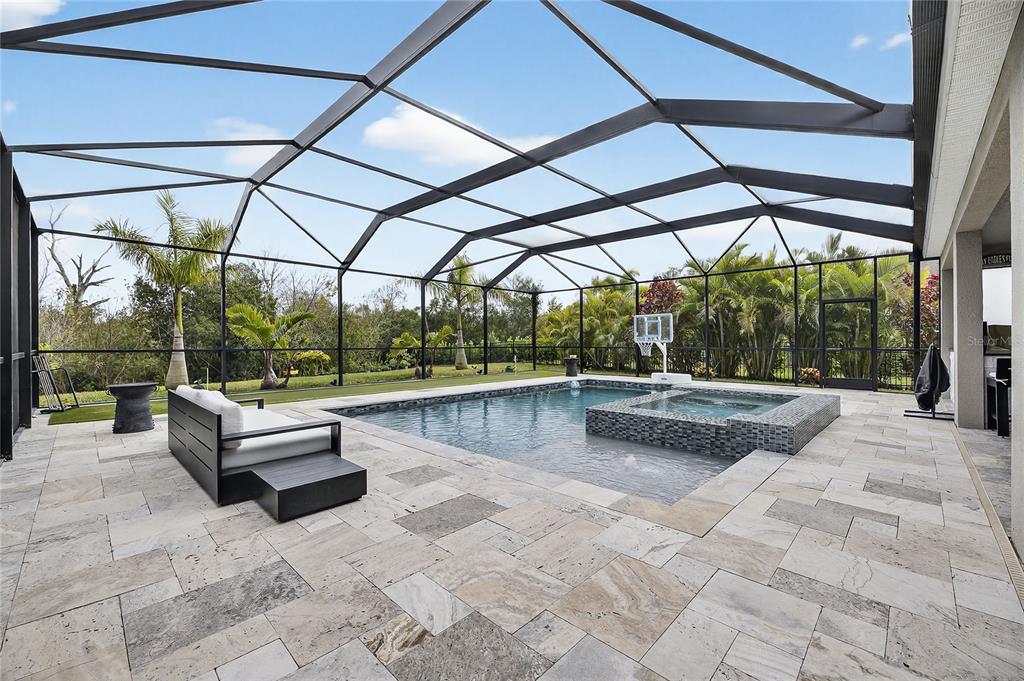 7424 Paradiso Drive Apollo Beach, FL 33572 - Photo 14 of 99 a view of swimming pool with a couches in a patio