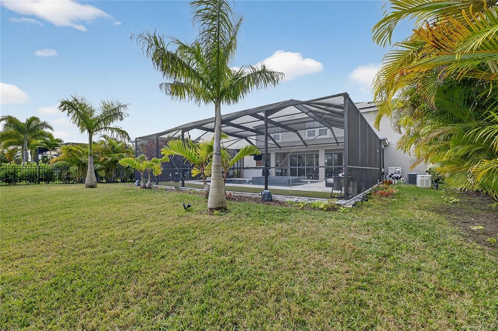 7424 Paradiso Drive Apollo Beach, FL 33572 - Photo 22 of 99 a house with garden in front of it