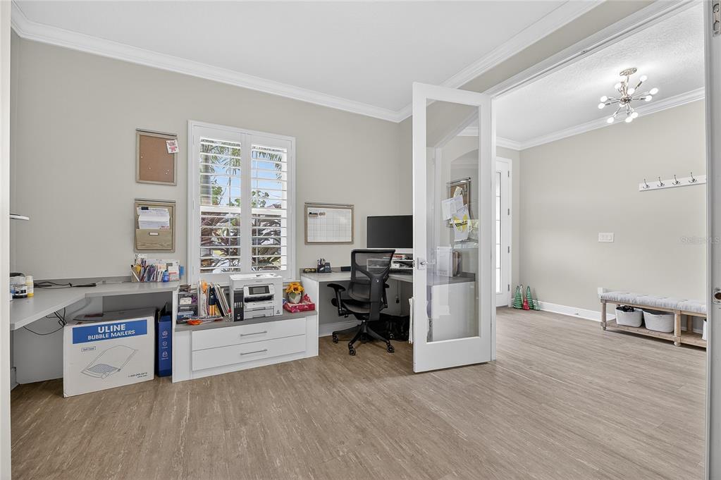 7424 Paradiso Drive Apollo Beach, FL 33572 - Photo 31 of 99 a view of a livingroom with furniture and a flat screen tv