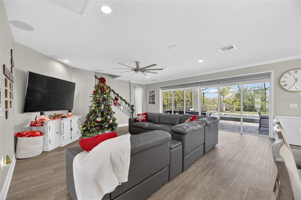 7424 Paradiso Drive Apollo Beach, FL 33572 - Photo 34 of 99 a living room with furniture and a flat screen tv